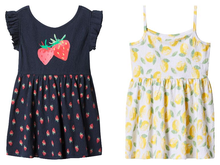 Sommerkleider für Mädchen: ein blaues mit Erdbeeren und ein weißes mit Zitronen.