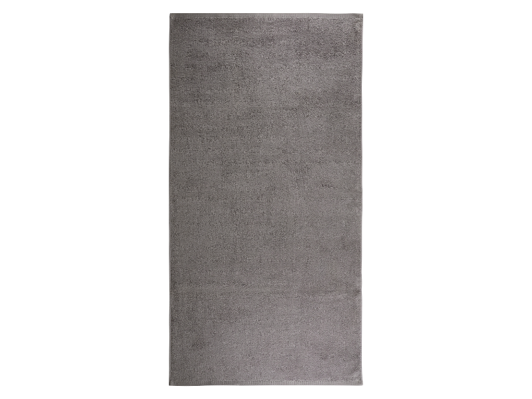 Ein graues Badetuch.