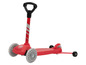 Ein roter Playtive Scooter mit vier Rädern.