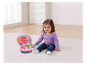 Baby spielt mit einem rosa VTech Laptop und Lernspielzeug.