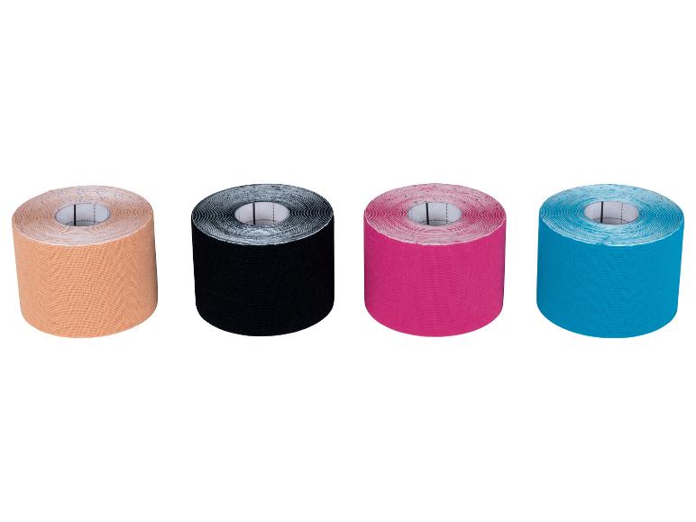 Vier Rollen Sporttape in Beige, Schwarz, Pink und Blau.