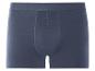 Ein Paar blaue Boxershorts.
