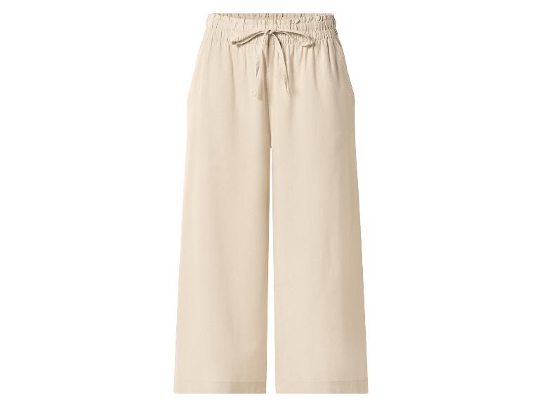 Beige weite Hose mit Gummizug und Kordelzug.