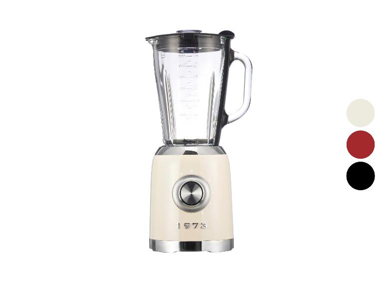 Ein cremefarbener Mixer im Stil der 1970er Jahre mit Glaskanne und fünf Geschwindigkeitsstufen.