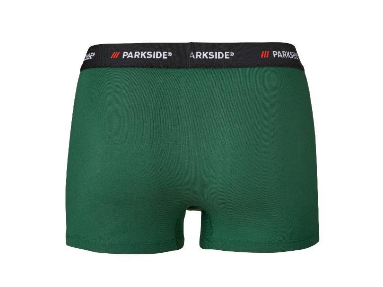 Grüne Boxershorts mit schwarzem Gummibund, weißem 'PARKSIDE®'-Schriftzug und rotem Zeichen.