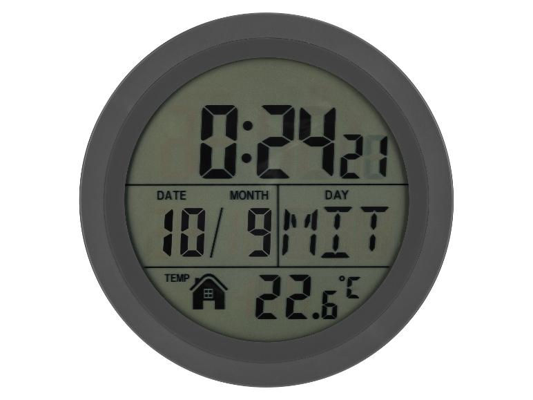 Runde Digitaluhr, die Uhrzeit, Datum und Temperatur anzeigt.