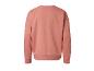Rosa Pullover mit langen Ärmeln.