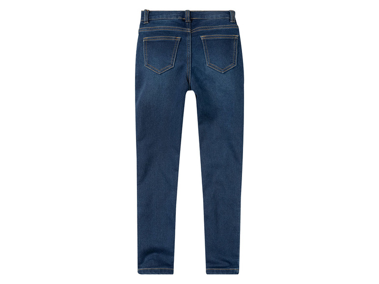 Eine blaue Jeanshose von hinten betrachtet.
