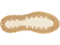 Nahaufnahme einer Schuhsohle mit hellbraunem und cremefarbenem Profil.