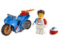 Lego Minifigur mit Motorrad, Helm und 'RR' Logo.
