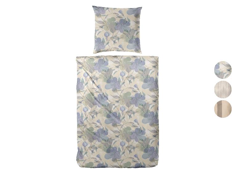 Florales Bettwäsche-Set mit Kissenbezug in hellen Beige-, Blau- und Grüntönen.