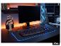 TRONIC® Gaming-Tastatur, Maus und beleuchtetes Mauspad auf dem Schreibtisch. [KI-generiertes Bild]