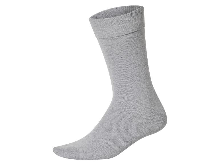 Graue Baumwollsocke, Seitenansicht, auf weißem Hintergrund.
