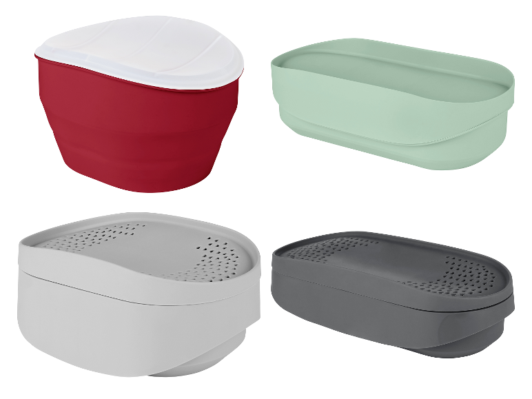 Vier Plastikbehälter in verschiedenen Farben mit Deckeln.