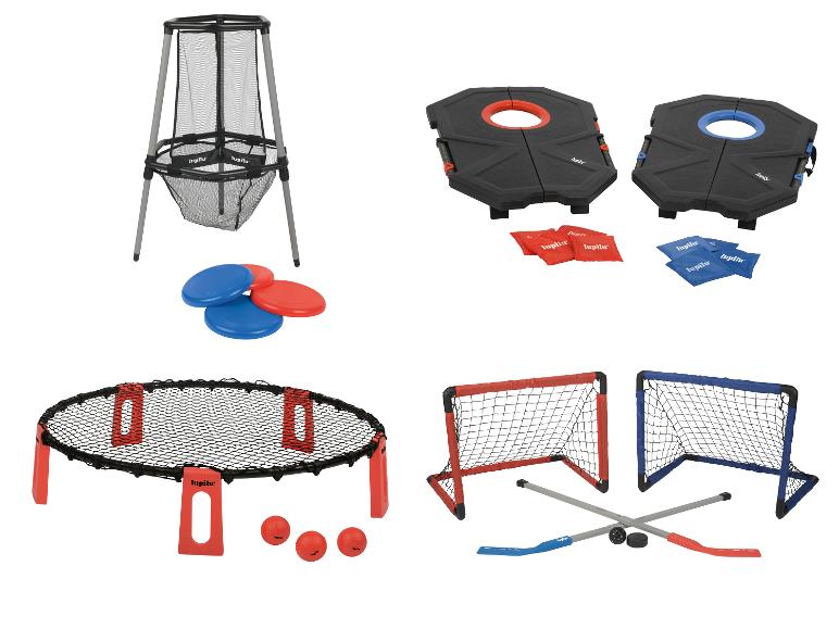 Eine Sammlung von Outdoor-Spielen, darunter ein Frisbee-Golfziel, Cornhole, Spikeball und Mini-Hockey.