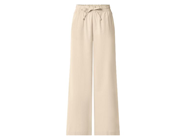 Beige weite Hose mit elastischem Bund und Kordelzug.