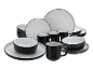 Schwarz-weißes Geschirr-Set: Teller, Schalen und Tassen.