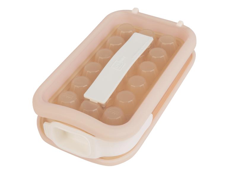 Hellrosa Silikon Eiswürfelform und Aufbewahrungsbox.