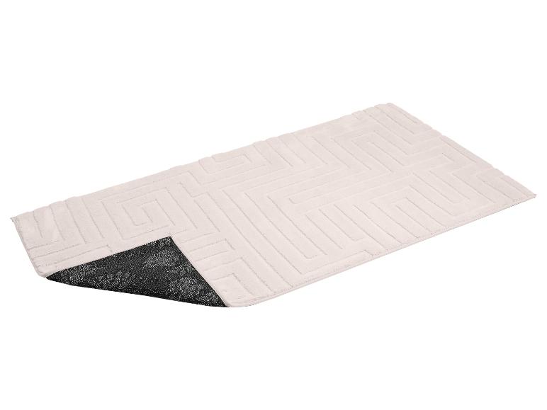 Hellbeiger Badteppich mit geometrischem Muster und dunkler floraler Anti-Rutsch-Unterseite