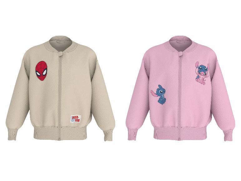 Zwei Kinder-Bomberjacken, eine beige mit Spinnenmaske, eine rosa mit zwei Alien-Charakteren.