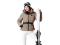 Frau in brauner Skijacke und weißer Hose hält Skier.