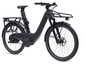 Ein schwarzes E-Bike mit Gepäckträger und Federgabel.