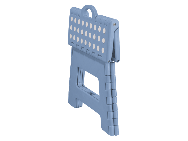 Blauer Klapphocker mit weißen Anti-Rutsch-Einsätzen.