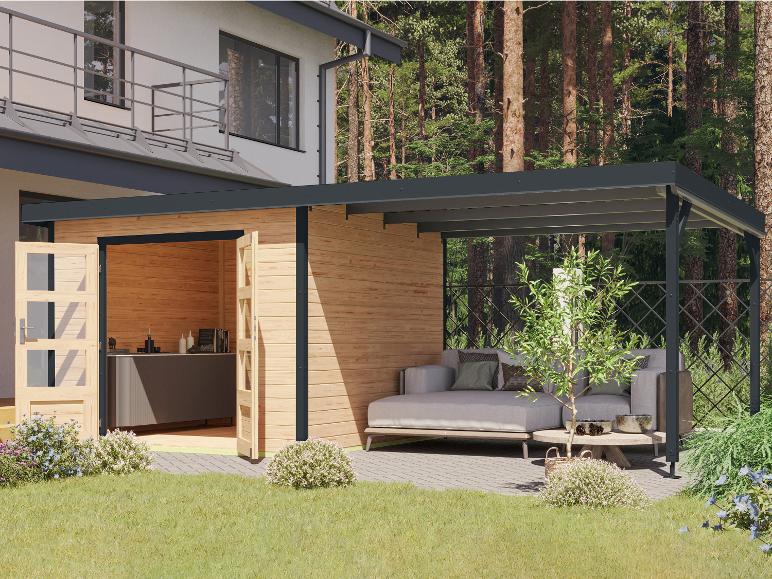 Ein Holz-Gartenhaus mit überdachter Terrasse und einer Lounge-Couch