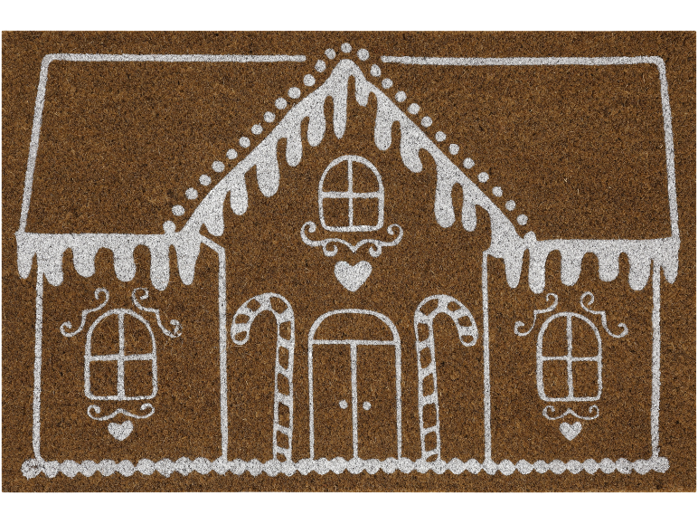 Fußmatte mit Lebkuchenhaus-Design, verziert mit Zuckerguss und Zuckerstangen.