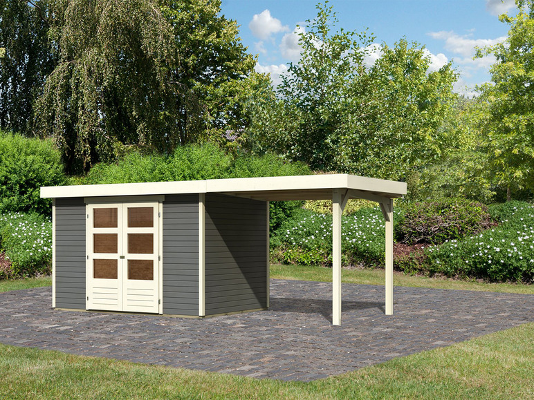 Ein Gartenhaus aus Holz mit Pergola.