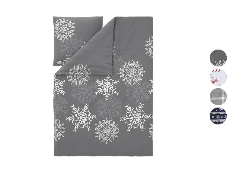 Graues Bettwäsche-Set mit weißen Schneeflocken und Designoptionen.
