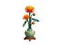 LEGO Blumenstrauß mit orangefarbenen Chrysanthemen in einem grünen Topf.