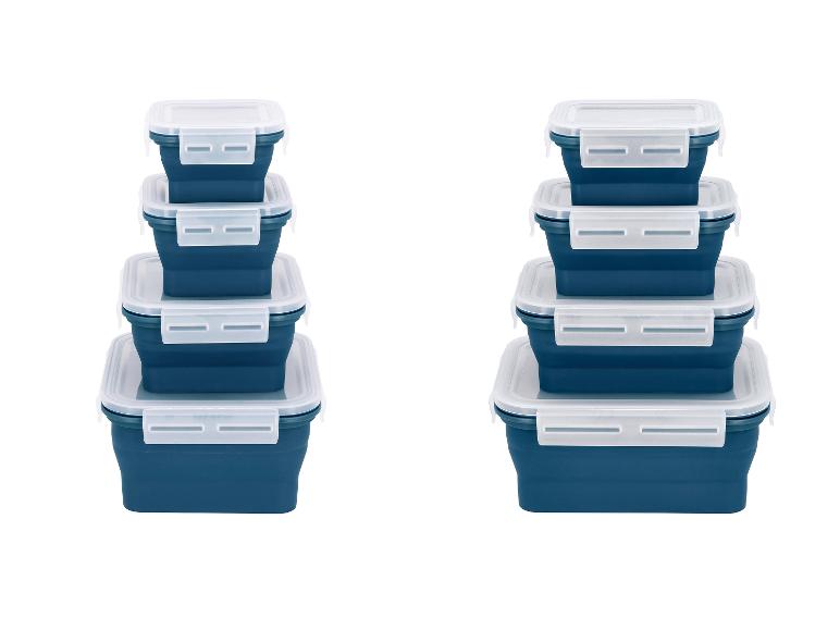 Zwei Stapel blauer faltbarer Lebensmittelbehälter mit weißen Deckeln.