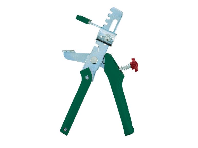 Ein grüner Fliesenschneider mit einem Metallrahmen.