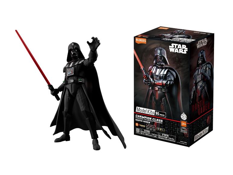 Darth Vader Actionfigur mit rotem Lichtschwert und Star Wars Modellbausatzbox.