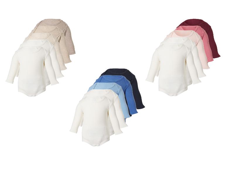 Set aus 15 langärmeligen Babybodys in Beige-, Rosa- und Blautönen.