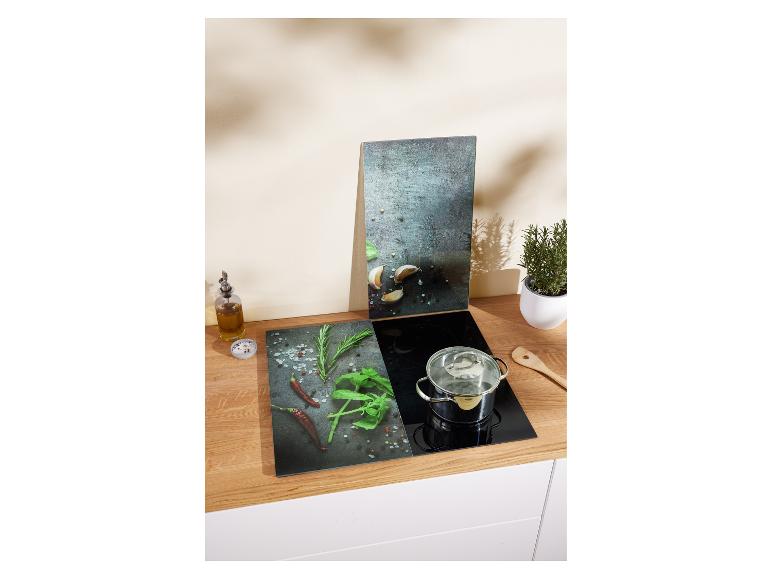 Kochfeldabdeckung aus Glas mit kulinarischem Motiv.