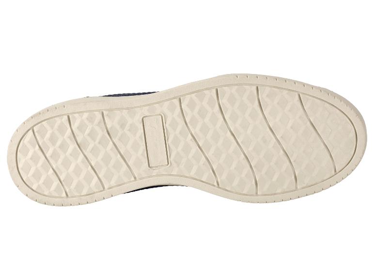 Beige Sportschuhsohle mit Rautenmuster und geschwungenen Linien.