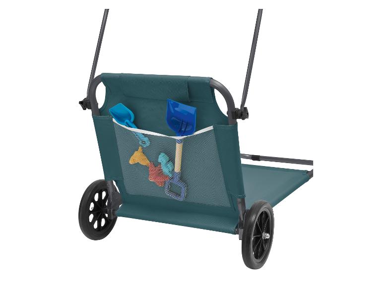 Strandwagen mit teal Stoff und Netztasche, die blaue Schaufeln und Sandformen enthält.