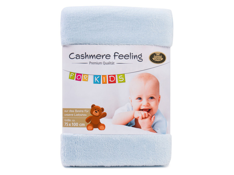 Eine blaue Cashmere Feeling Babydecke für Kinder mit einem Teddybär.
