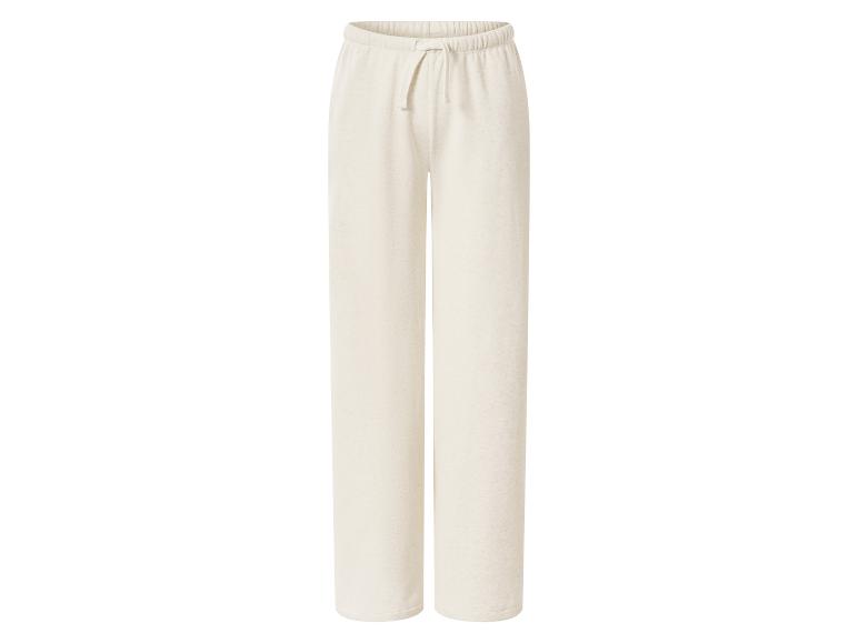 Beige weite Jogginghose mit Kordelzug in der Taille.