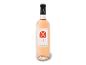 Eine Flasche Roséwein mit einem Etikett, auf dem „Vin de Provence“ steht.