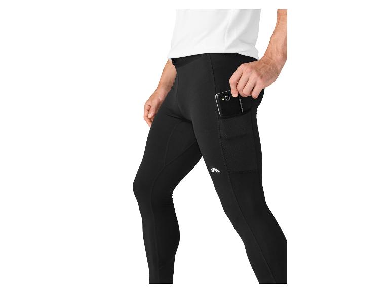 Mann in schwarzen Laufleggings mit Handytasche.