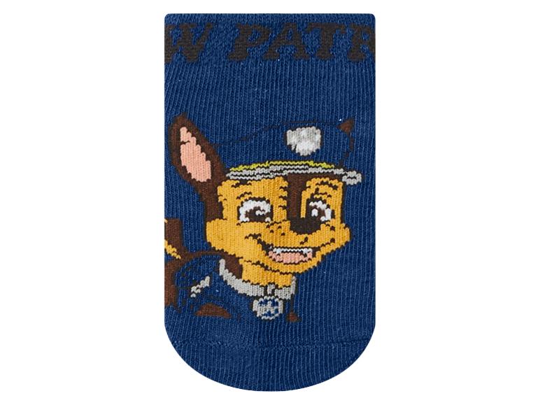 Blaue Socke mit Cartoon-Polizeihund-Motiv.