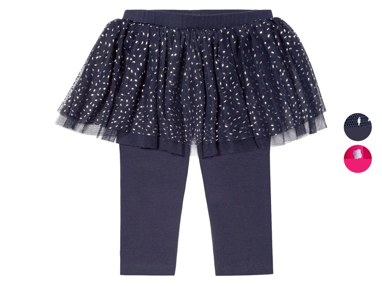 Dunkelblaue Leggings mit einem Tüllrock mit silbernen Punkten.