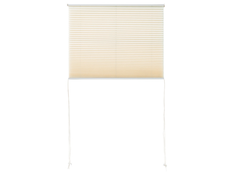 Ein cremefarbener Plissee-Vorhang mit weißen Schnüren.