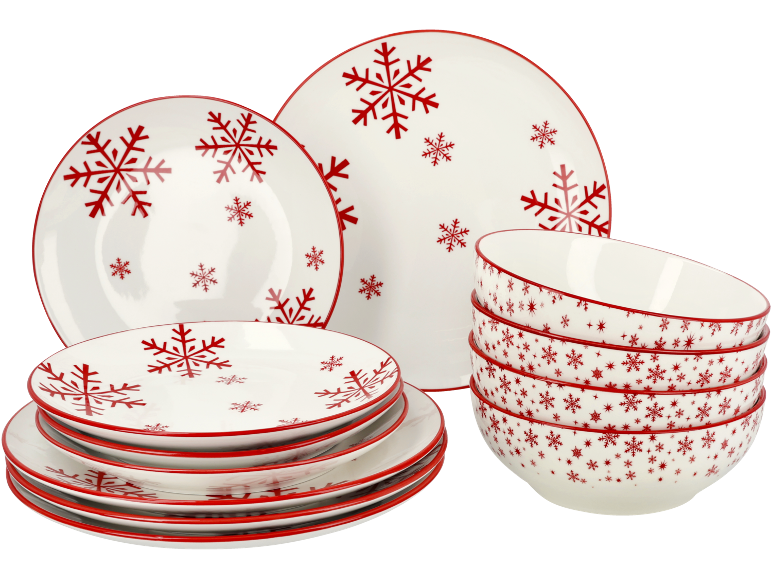 Weißes und rotes Weihnachtsservice mit Schneeflockenmustern.