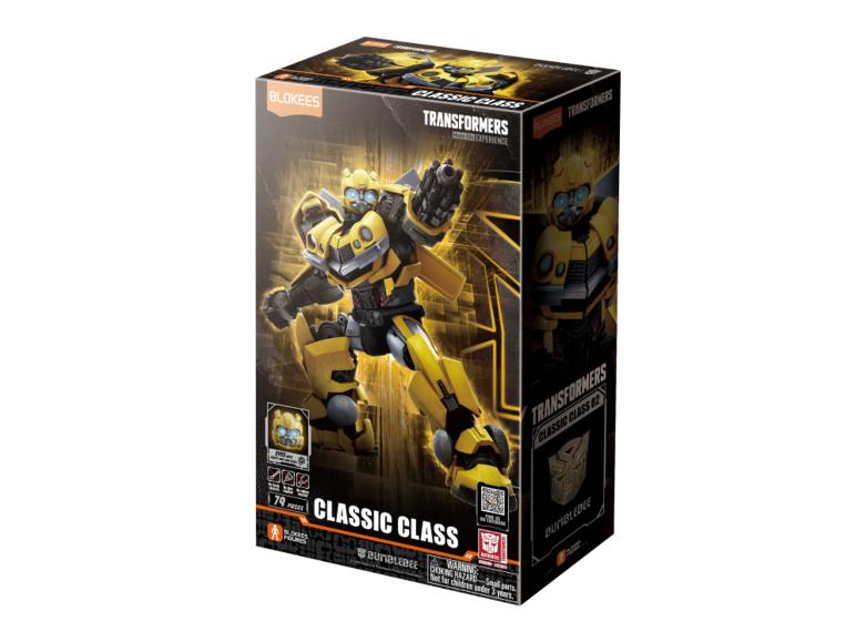 Spielzeugschachtel mit einer gelben Roboterfigur, beschriftet als „Classic Class“ mit 79 Teilen.