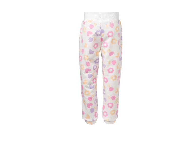 Weiße Kinder-Jogginghose mit bunten Blumen- und Herzmustern.