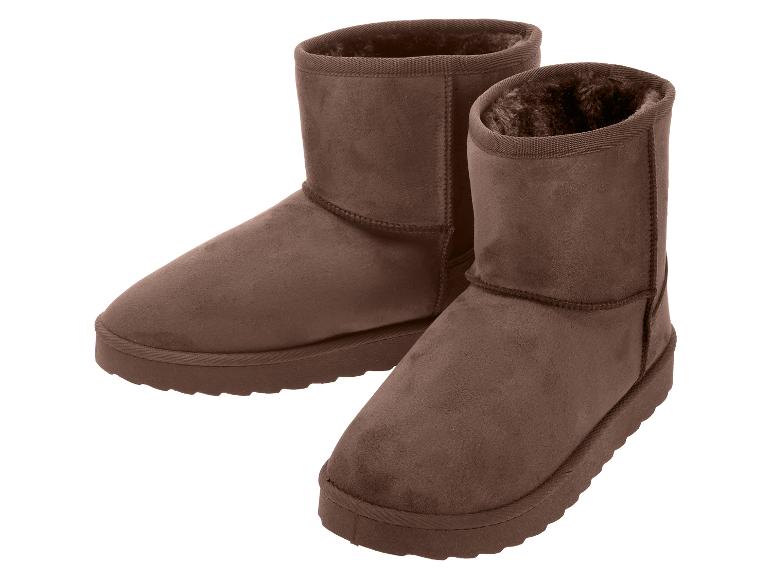 Ein Paar braune Stiefel mit Fellfutter, ideal für den Winter.